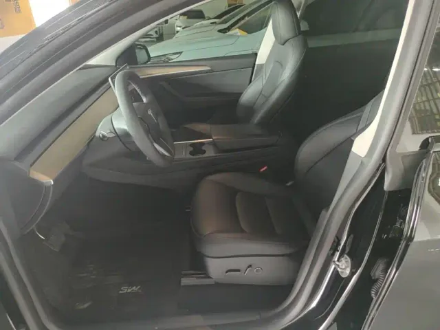 Tesla Model Y — Фото автомобиля 14