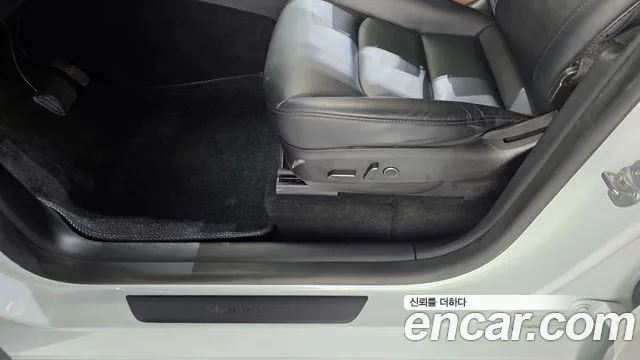 Tesla Model Y — Фото автомобиля 27