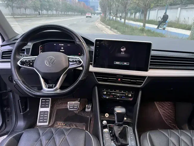 Volkswagen Tiguan L — Фото автомобиля 12