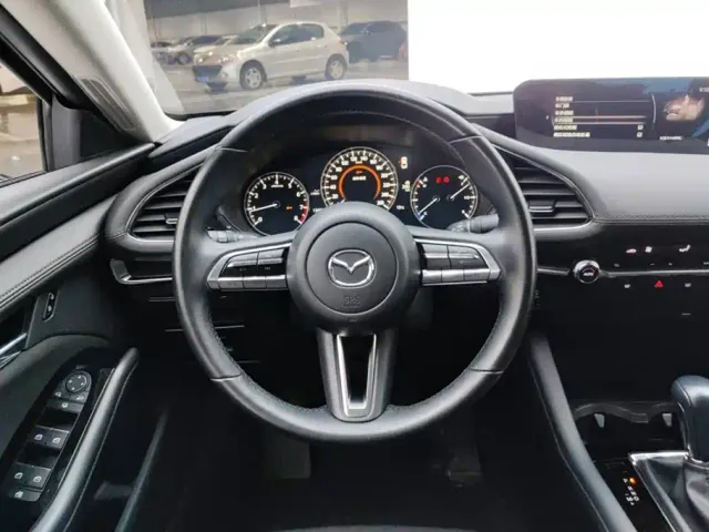 Mazda Axela — Фото автомобиля 15