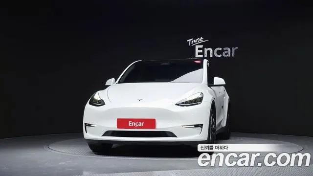 Tesla Model Y — Фото автомобиля 3