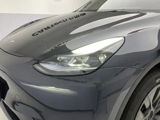 Tesla Model Y — Фото автомобиля 9