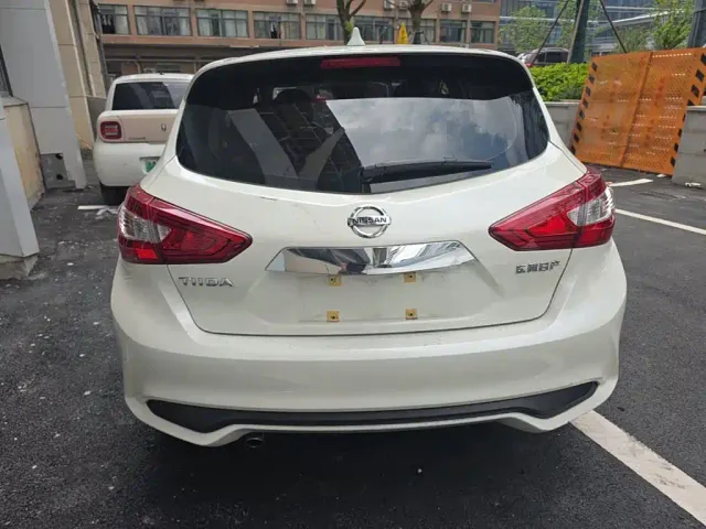 Nissan Tiida — Фото автомобиля 5