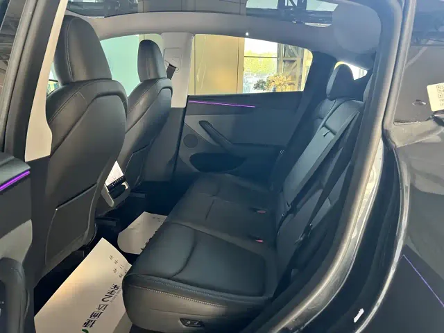Tesla Model Y — Фото автомобиля 14