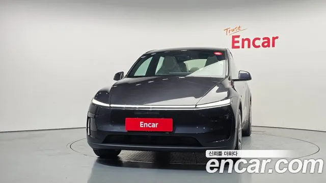 Tesla Model Y — Фото автомобиля 3
