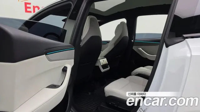 Tesla Model Y — Фото автомобиля 27