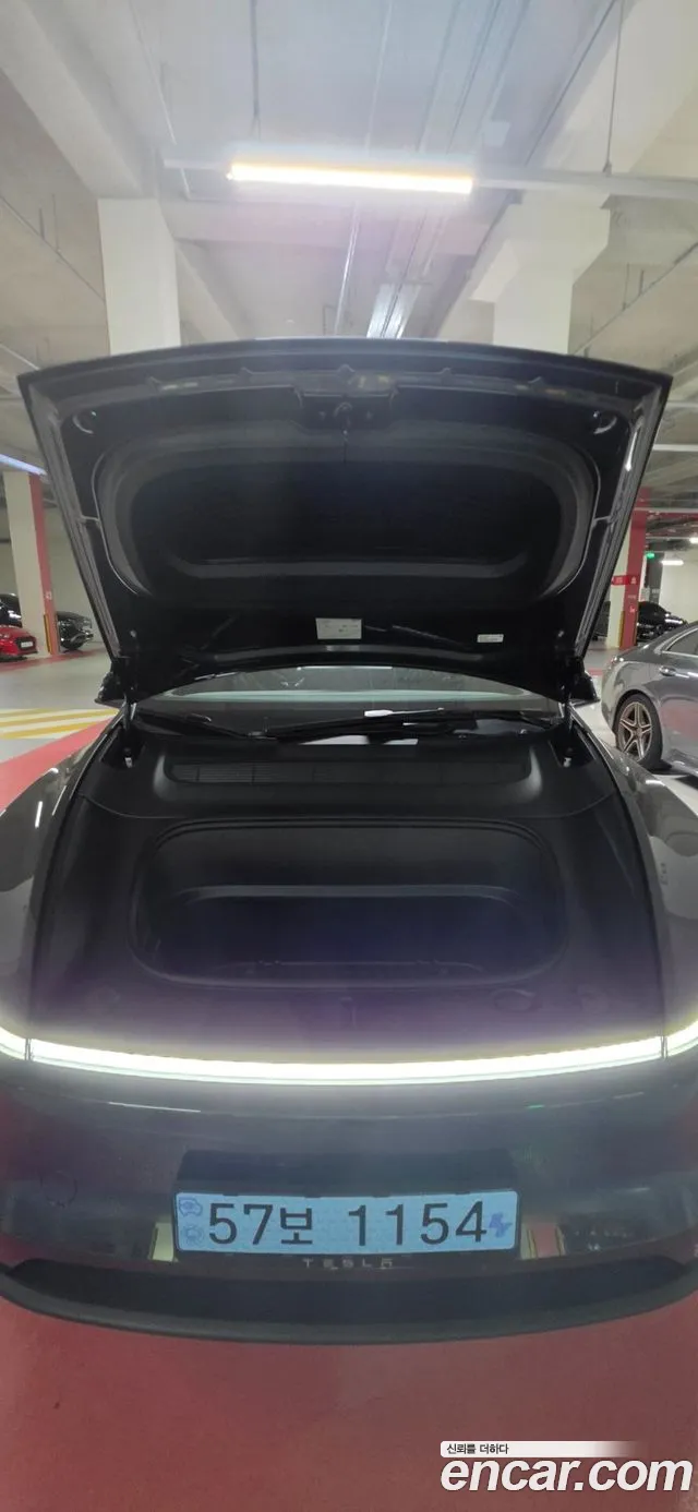 Tesla Model Y — Фото автомобиля 14