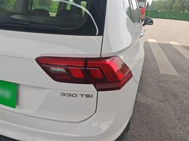 Volkswagen Tiguan L — Фото автомобиля 7