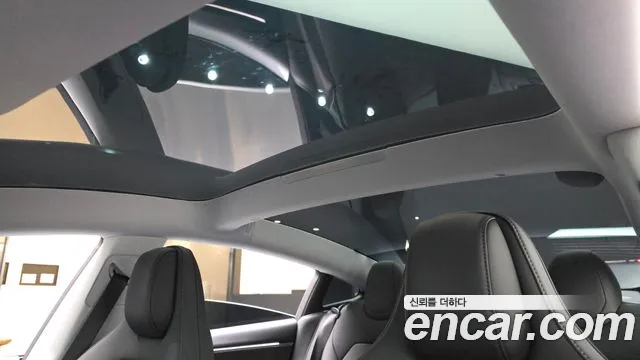 Tesla Model 3 — Фото автомобиля 15