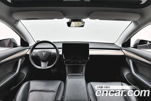 Tesla Model 3 — Фото автомобиля 15