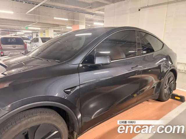 Tesla Model Y — Фото автомобиля 4