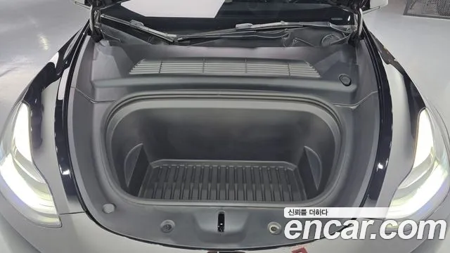 Tesla Model Y — Фото автомобиля 6