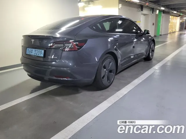 Tesla Model 3 — Фото автомобиля 2