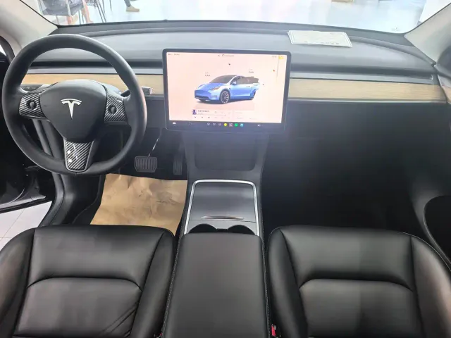 Tesla Model Y — Фото автомобиля 7