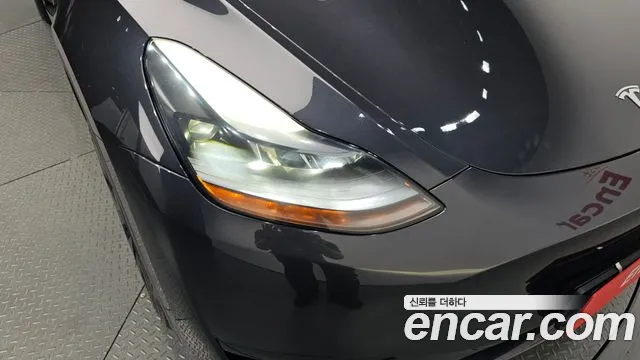 Tesla Model Y — Фото автомобиля 22