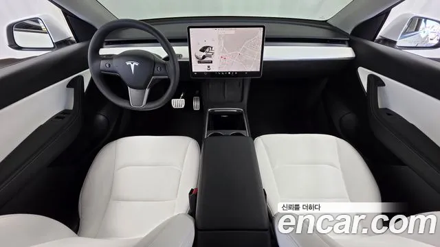 Tesla Model Y — Фото автомобиля 7