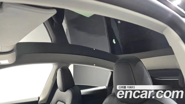 Tesla Model Y — Фото автомобиля 21