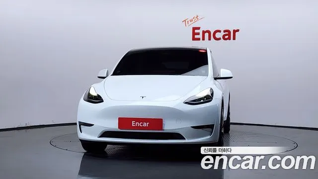 Tesla Model Y — Фото автомобиля 3