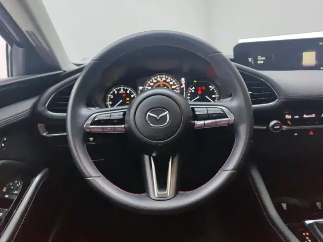 Mazda Axela — Фото автомобиля 15