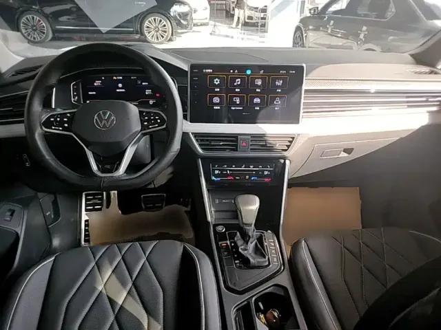 Volkswagen Tiguan L — Фото автомобиля 9