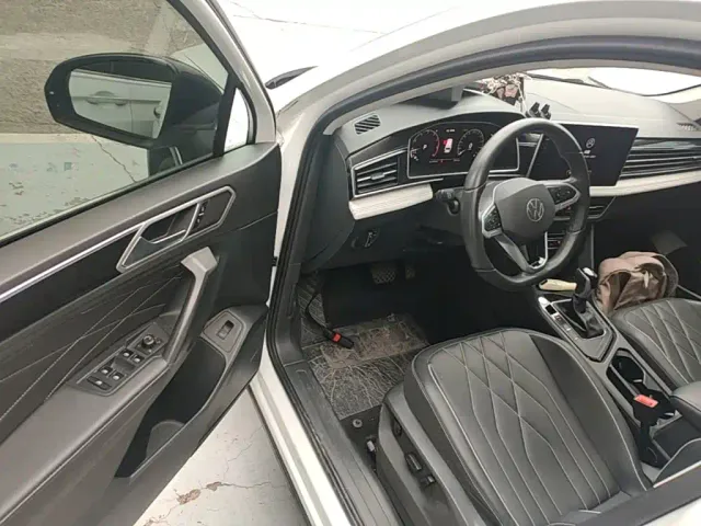 Volkswagen Tiguan L — Фото автомобиля 15