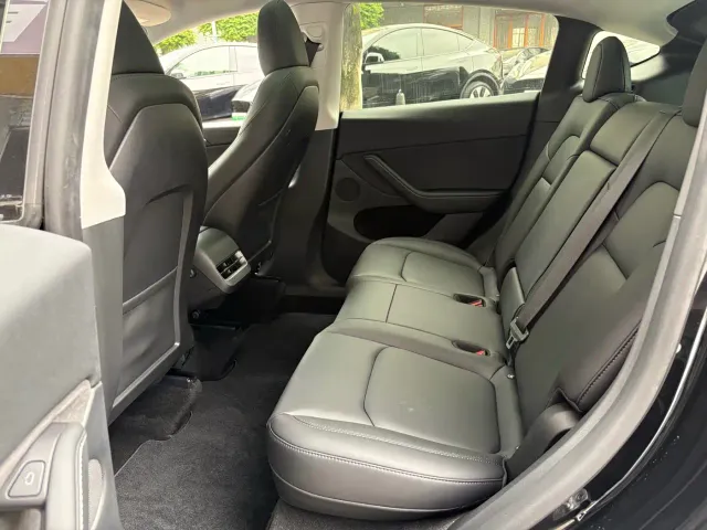 Tesla Model Y — Фото автомобиля 10