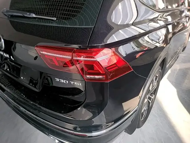 Volkswagen Tiguan L — Фото автомобиля 7