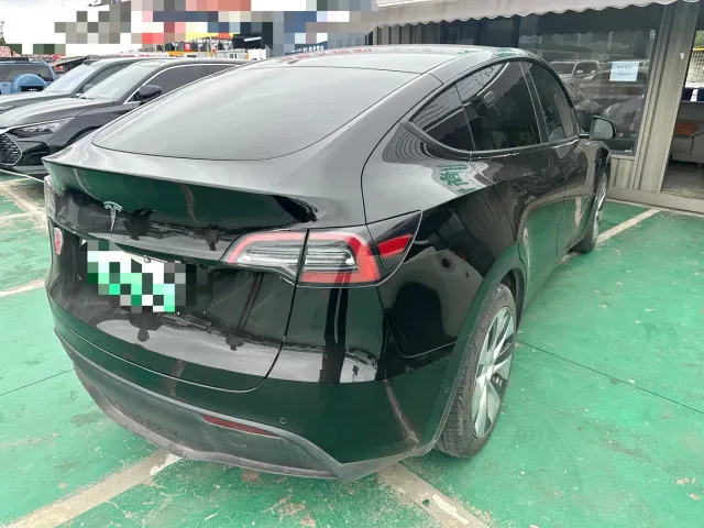 Tesla Model Y — Фото автомобиля 7