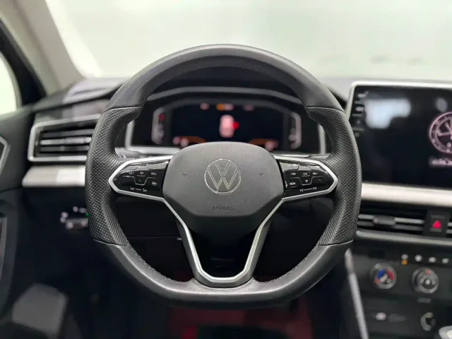 Volkswagen Tiguan L — Фото автомобиля 11