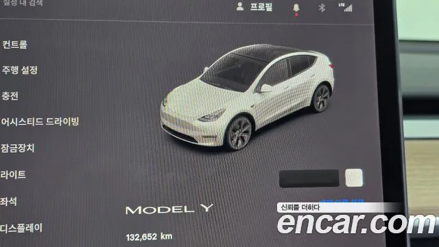 Tesla Model Y — Фото автомобиля 11