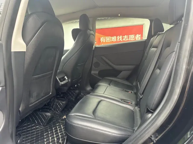 Tesla Model Y — Фото автомобиля 6