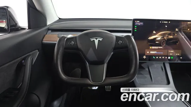 Tesla Model Y — Фото автомобиля 19