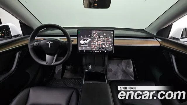 Tesla Model Y — Фото автомобиля 7