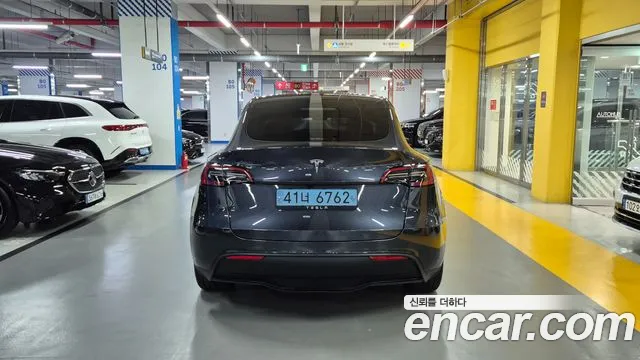 Tesla Model Y — Фото автомобиля 2