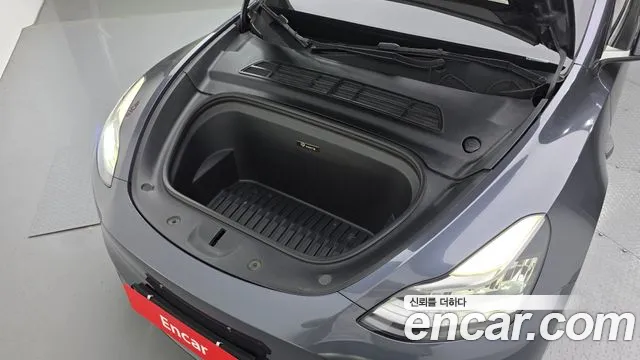 Tesla Model Y — Фото автомобиля 6