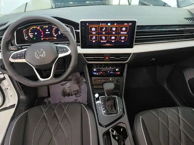 Volkswagen Tiguan L — Фото автомобиля 13