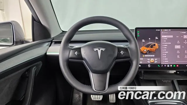 Tesla Model Y — Фото автомобиля 12