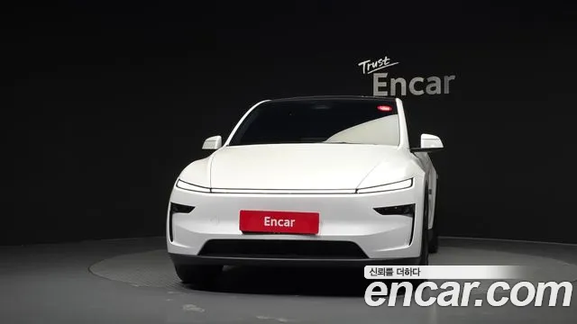 Tesla Model Y — Фото автомобиля 3