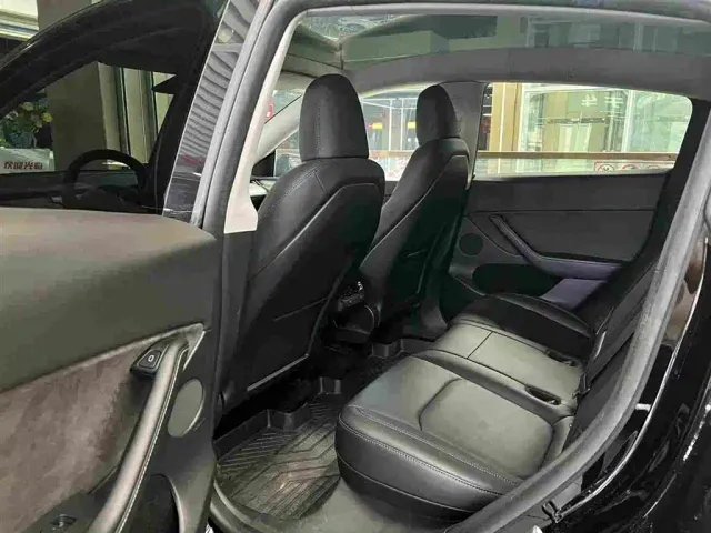 Tesla Model Y — Фото автомобиля 6