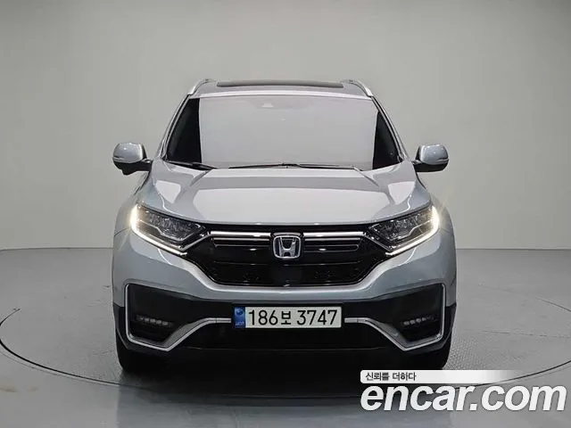 Honda CR-V CR-V 5-е поколение 2.0 гибрид Touring 4WD — Фото автомобиля 2
