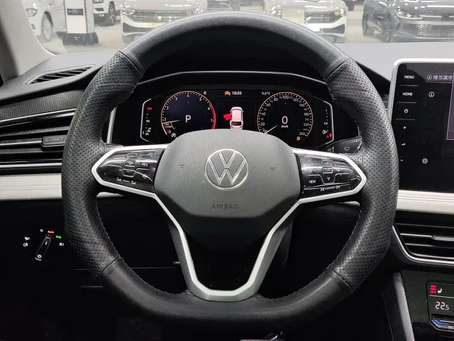 Volkswagen Tiguan L — Фото автомобиля 11