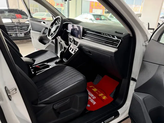 Volkswagen Tiguan L — Фото автомобиля 9