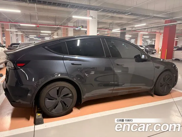 Tesla Model Y — Фото автомобиля 2