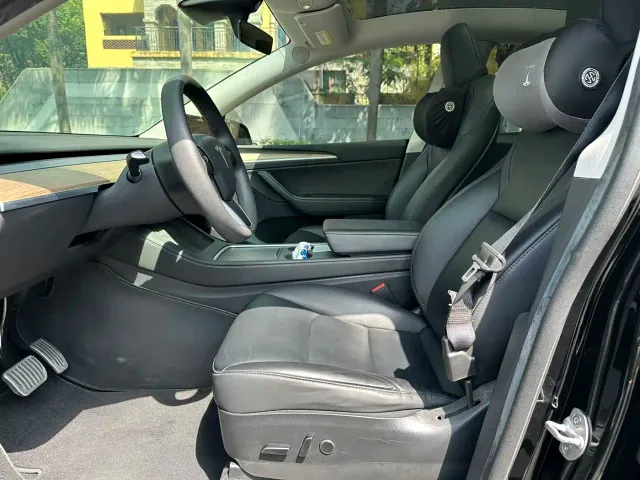Tesla Model Y — Фото автомобиля 7