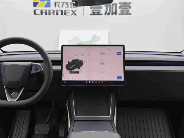 Tesla Model Y — Фото автомобиля 12