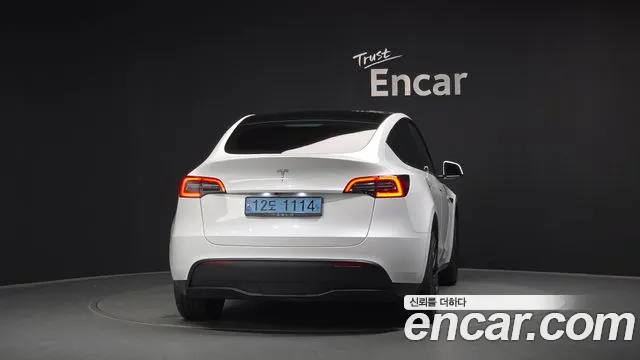 Tesla Model Y — Фото автомобиля 4