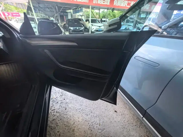 Tesla Model Y — Фото автомобиля 18
