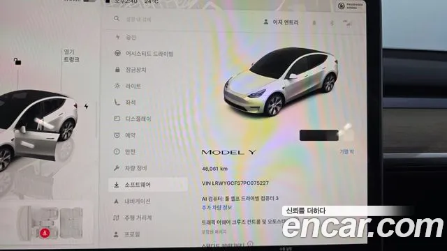 Tesla Model Y — Фото автомобиля 11