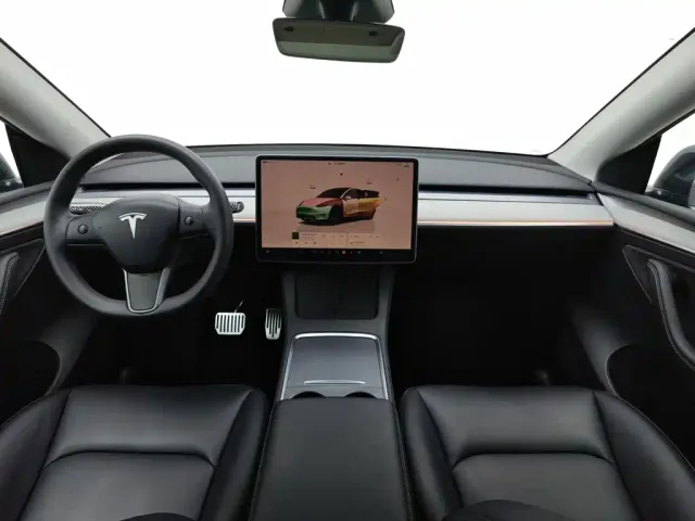 Tesla Model Y — Фото автомобиля 5
