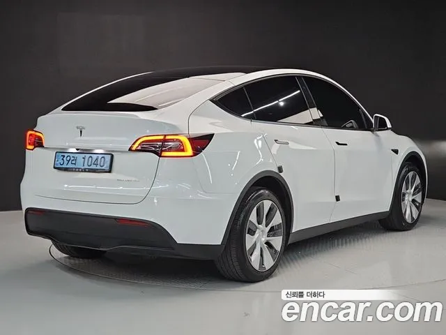 Tesla Model Y — Фото автомобиля 4